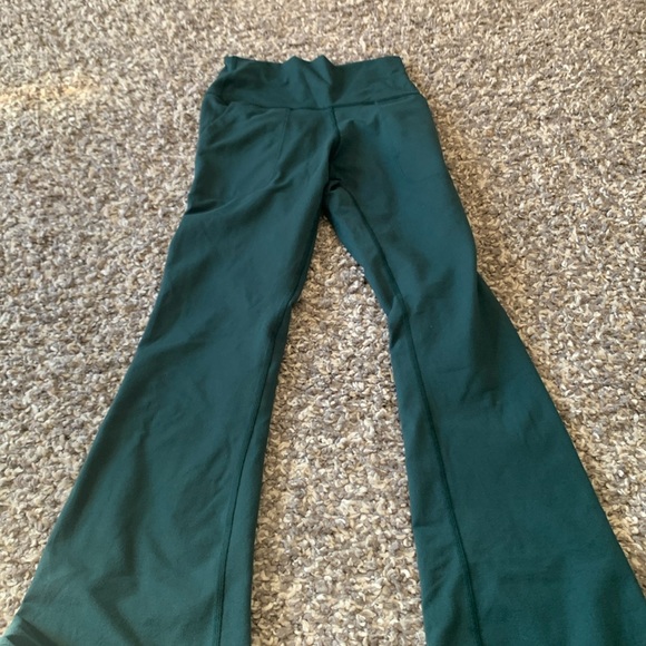 Selling green athletic flared pants, size small - Picture 1 of 2